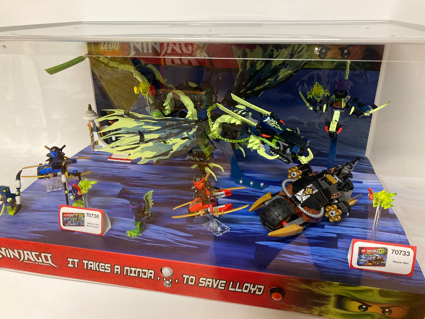 LEGO® Attack of the Morro Dragon & Blaster Bike Store Display